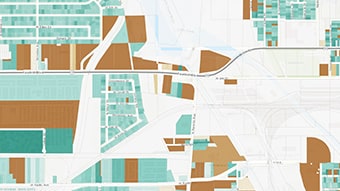 Um mapa claro observando conjuntos de dados de lotes nas cores verde claro, azul-petróleo e marrom