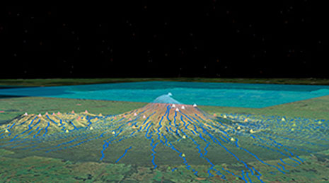Digital image of land in green, blue, and black with small triangular data points