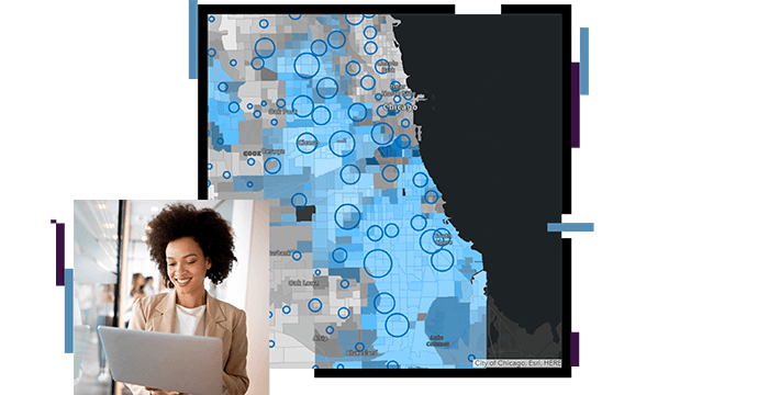 Woman looking at a laptop, map of a coastline shaded blue